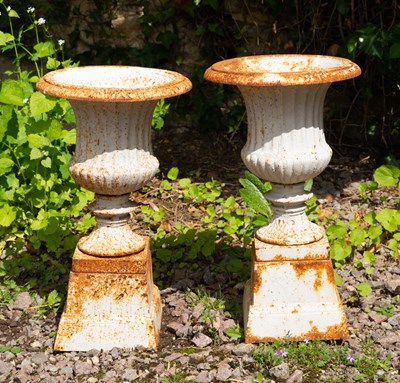 Lot 831 - A pair of white painted cast iron small size...