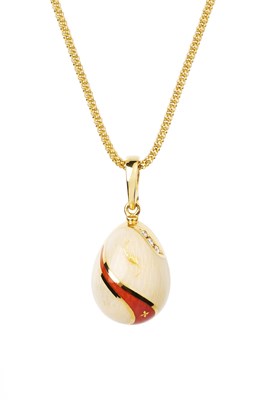 Lot 149 - An enamel and diamond set egg pendant by...