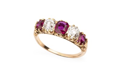 Lot 168 - A ruby and diamond five stone ring, the...