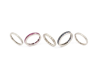 Lot 167 - A collection of full hoop eternity rings,...