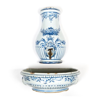 Lot 148 - An 18th century French Rouen faience lavabo...