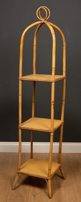 Lot 221 - A blonde bamboo three tier whatnot 30cm wide x...