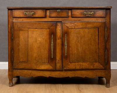 Lot 282 - An early 19th century French oak and walnut...