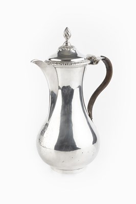 Lot 396 - An early George III silver hot water pot, of...