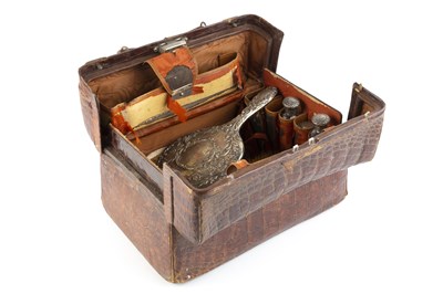 Lot 431 - A late Victorian crocodile skin dressing case,...