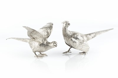 Lot 400 - A pair of Continental silver models of...