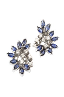 Lot 104 - A pair of sapphire and diamond earrings, each...