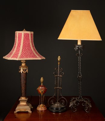 Lot 217 - A 20th century painted wrought iron table lamp,...