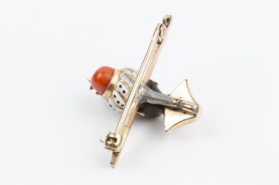 Lot 25 - An enamel and gem set blackamoor bar brooch,...
