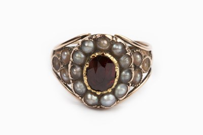 Lot 32 - A 19th century gem set cluster ring, the...