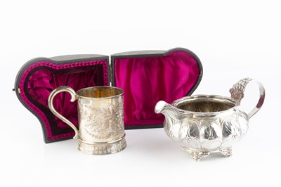 Lot 410 - A George IV silver milk jug, the lobed body...