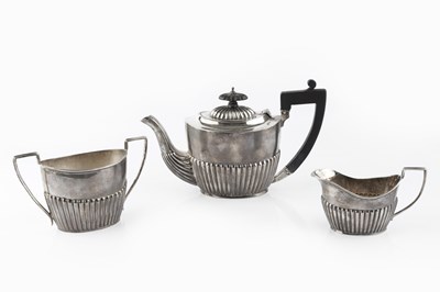 Lot 446 - A late Victorian silver bachelor's teapot, and...