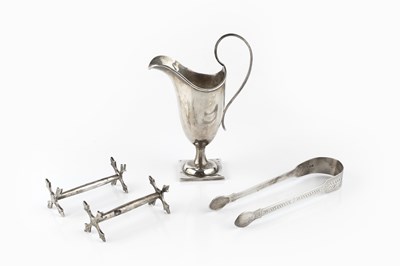 Lot 458 - A pair of George III silver sugar nips, with...