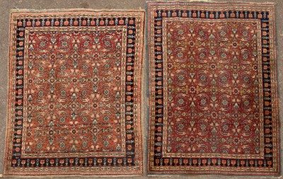 Lot 447 - A near pair of Persian style red and blue...