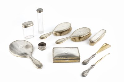 Lot 421 - A George V silver dressing table set, with...