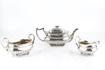 Lot 426 - A George III Scottish silver three piece tea...