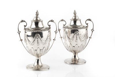 Lot 483 - A pair of George III silver twin handled urns,...