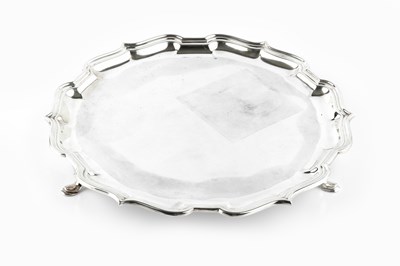 Lot 484 - A silver salver, with shaped piecrust border,...