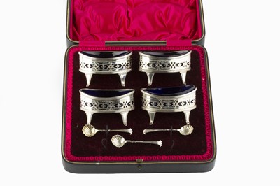 Lot 486 - A set of four Edwardian silver oval salts, of...