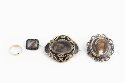 Lot 94 - Three 19th century memorial brooches, the...