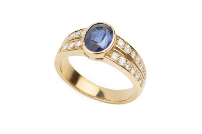 Lot 116 - A sapphire and diamond dress ring, the oval...