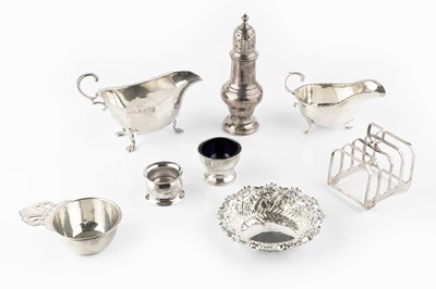 Lot 492 - A collection of silver, comprising a baluster...