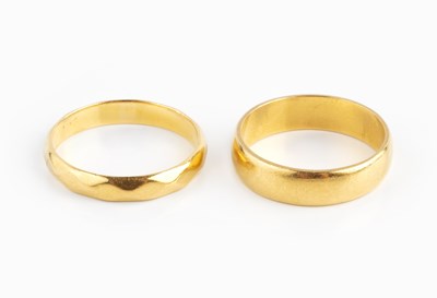 Lot 61 - Two 22ct gold wedding bands, ring sizes N and...