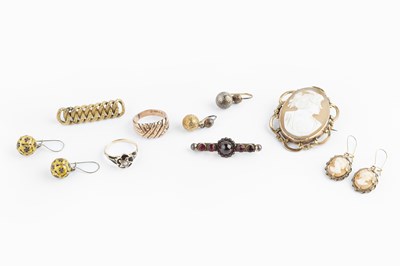 Lot 230 - A collection of jewellery, comprising a black...