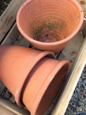 Lot 705 - Three large flower pot, 32cm diameter together...