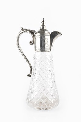 Lot 471 - A silver mounted cut glass claret jug, with...