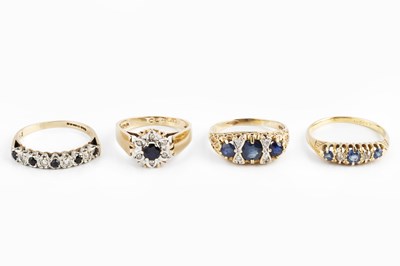 Lot 40 - A sapphire and diamond half hoop ring, the...