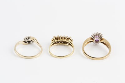 Lot 41 - A pink sapphire and diamond cluster ring, the...