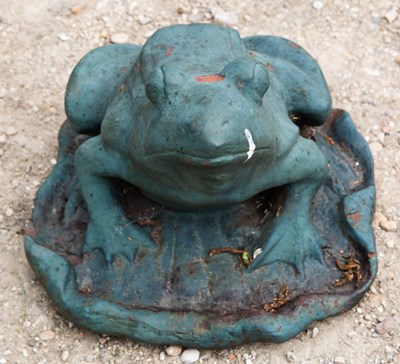 Lot 707 - A green painted cast iron frog on a lily leaf,...