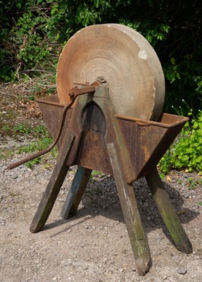 Lot 710 - An antique grinding wheel the sandstone wheel...