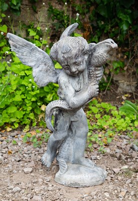 Lot 711 - A lead fountain head in the form of cupid...