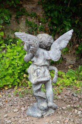 Lot 711 - A lead fountain head in the form of cupid...