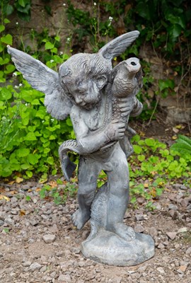 Lot 711 - A lead fountain head in the form of cupid...
