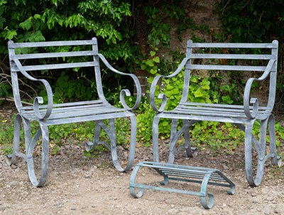 Lot 717 - A pair of galvanized wrought iron armchairs...