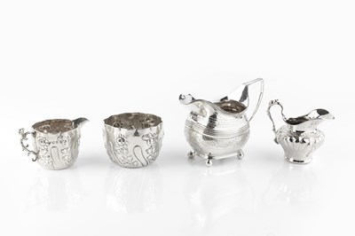 Lot 520 - A George III silver milk jug, with reeded and...