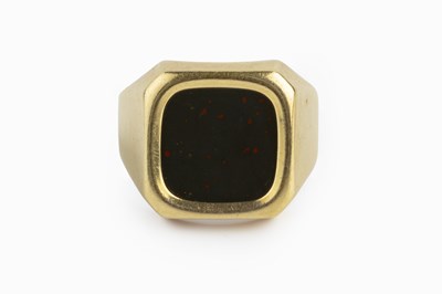 Lot 64 - A bloodstone signet ring, the cushion-shaped...