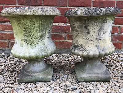 Lot 731 - A pair of small cast reconstituted stone urns...