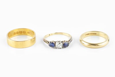 Lot 111 - A sapphire and diamond dress ring, the cushion-...