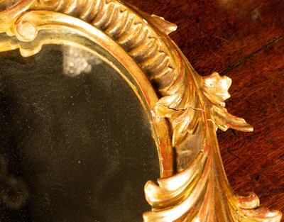 Lot 33 - Two similar ornately carved giltwood wall mirrors