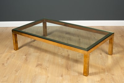 Lot 246 - A brass rectangular coffee table with glass...