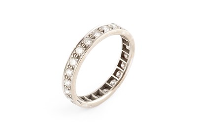 Lot 143 - A diamond full hoop ring, set throughout with...