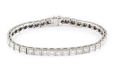 Lot 161 - A diamond line bracelet, designed as a series...