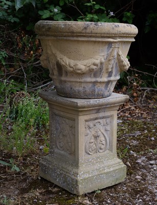 Lot 737 - A composite stone urn, 48cm diameter x 36cm...