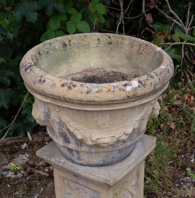 Lot 737 - A composite stone urn, 48cm diameter x 36cm...