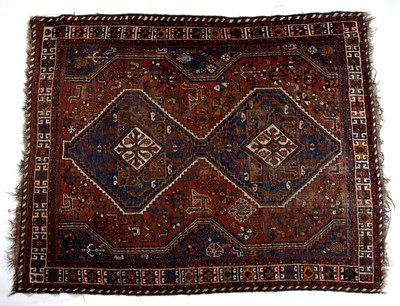 Lot 179 - Red ground rug Hamadan, with two central...