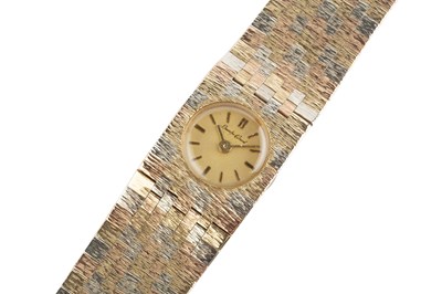 Lot 180 - A lady's 9ct three colour gold bracelet watch,...